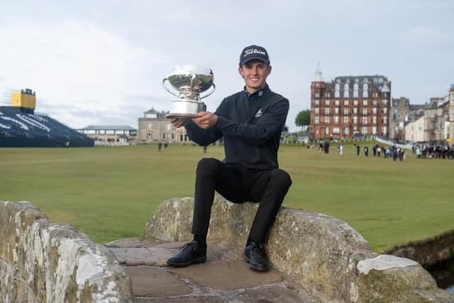Connor McKinney celebrates winning the St Andrews Links Trophy, having closed with a seven-under 65 on the Old Course. Picture: St Andrews Links Trust