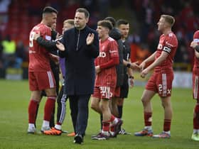 Rangers manager Michael Beale applauds the fans after the defeat by Aberdeen at Pittodrie.