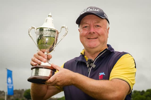 Dunnikier Park's Derek Paton shows off the trophy after winning the Scottish Senior Men's Open at Stirling. Picture: Christopher Young/Scottish Golf