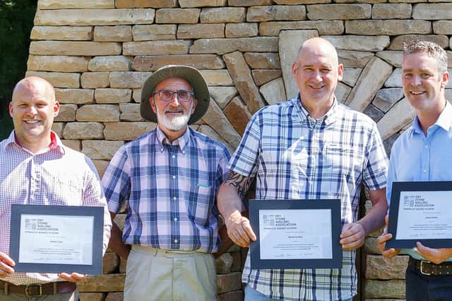 Pictured next to the doocot with their awards, from left to right: Martin Tyler, Richard Love (DSWA), Stevie Gordon and James Parker (pic: James Parker Sculpture)