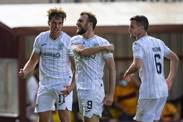 Christian Doidge, centre, celebrates after scoring just three minutes into his appearance.