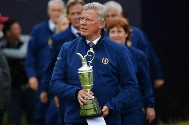R&A chief executive Martin Slumbers brings out the Claret Jug for the trophy presentation during the 148th Open Championship at Royal Portrush in 2019. Picture: Stuart Franklin/Getty Images.