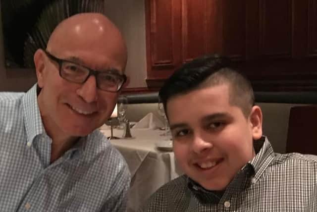 Tim Rosaforte pictured with his nephew Grayson at Jonathan's Landing in Jupiter, Florida. Picture: Neil Lockie