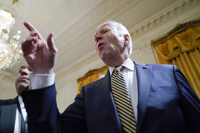 President Joe Biden responds to a question about Russian President Vladimir Putin in the East Room of the White House, Wednesday, March 16, 2022, in Washington.