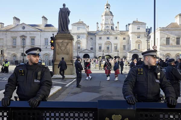 Police line the streets leading to the cenotaph as part of the Met Police's 'ring of steel' ahead of the the Armistice Day remembrance service. Picture: Alex McBride/Getty
