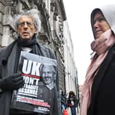 Piers Corbyn (left) outside the Old Bailey, London, ahead of a judgement in the Julian Assange extradition case. Wikileaks founder Assange, 49, faces an 18-count indictment, alleging a plot to hack computers and a conspiracy to obtain and disclose national defence information.