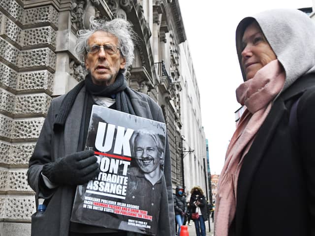 Piers Corbyn (left) outside the Old Bailey, London, ahead of a judgement in the Julian Assange extradition case. Wikileaks founder Assange, 49, faces an 18-count indictment, alleging a plot to hack computers and a conspiracy to obtain and disclose national defence information.