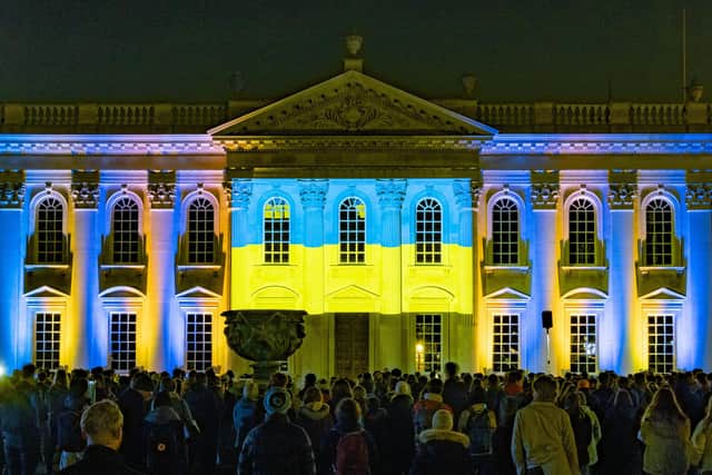 People in Cambridge gathered outside Kings college in Cambridge on Thursday night to prtoest against the war in Ukraine before moving to the Senate where the University of Cambridge was to hold a vigil for all those affected by the Ukraine invasion.