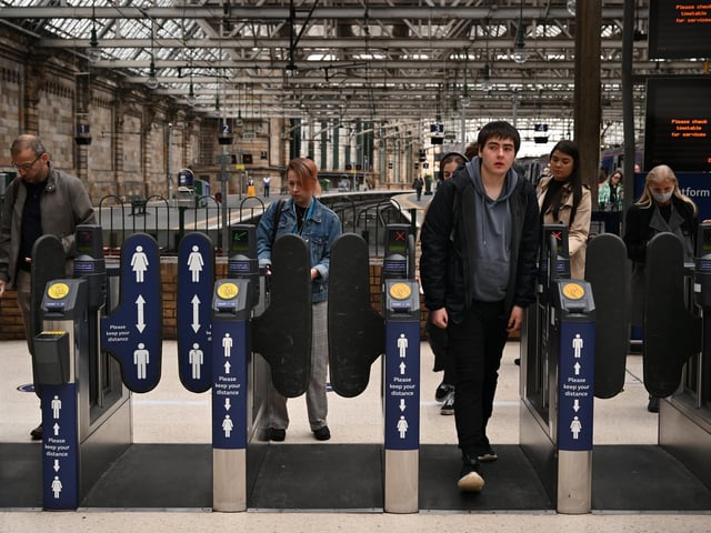Members of the public pass through Central Station on June 21, 2022 in Glasgow.. The biggest rail strikes in 30 years started on Monday night with trains cancelled across the UK for much of the week. (Photo by Jeff J Mitchell/Getty Images)