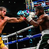 YouTube personality Logan Paul throws a left at former world welterweight king Floyd Mayweather in an eight-round exhibition bout at Hard Rock Stadium in Miami. Picture: CHANDAN KHANNA/AFP via Getty Images