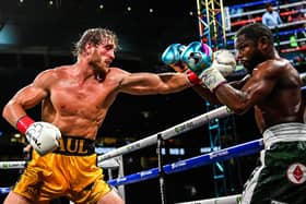 YouTube personality Logan Paul throws a left at former world welterweight king Floyd Mayweather in an eight-round exhibition bout at Hard Rock Stadium in Miami. Picture: CHANDAN KHANNA/AFP via Getty Images