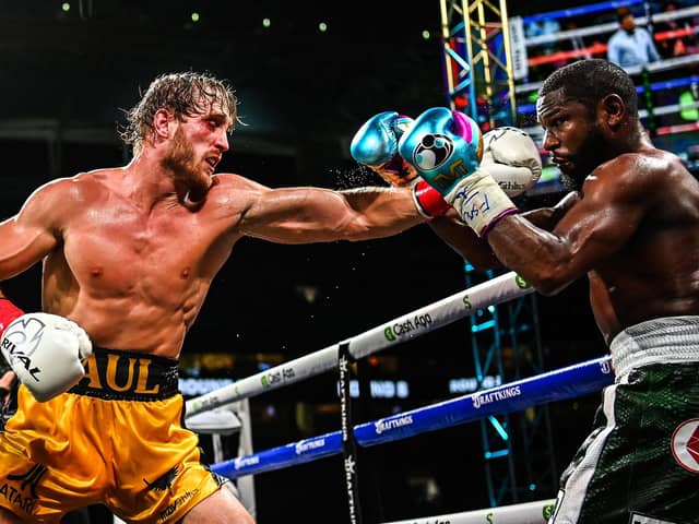 YouTube personality Logan Paul throws a left at former world welterweight king Floyd Mayweather in an eight-round exhibition bout at Hard Rock Stadium in Miami. Picture: CHANDAN KHANNA/AFP via Getty Images