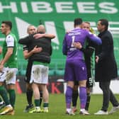 Celtic's Scott Brown with Hibs Alex Gogic, and Celtic's Leigh Griffiths with Hibs Ofir Marciano at full time.