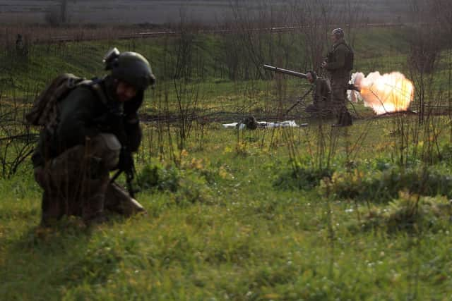 Ukrainian servicemen fire towards Russian positions on the frontline of the Donetsk region on November 21, 2022, amid the Russian invasion of Ukraine. (Photo by Anatolii Stepanov / AFP) (Photo by ANATOLII STEPANOV/AFP via Getty Images)