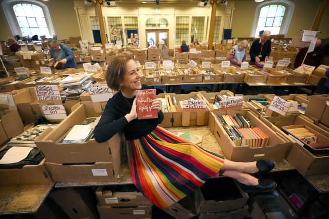 Broadcaster and journalist Kirsty Wark takes a look at a rare first edition copy of George Orwell’s ‘1984’, at The Christian Aid Week Book Sale at St Andrew’s and St George’s West Church, George Street, Edinburgh. Pic: Jane Barlow