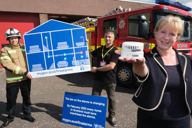 Shona Robison has said rules about fire alarms in homes will not be delayed for another year.