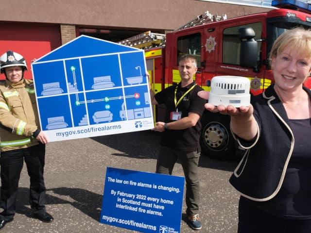 Shona Robison has said rules about fire alarms in homes will not be delayed for another year.