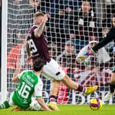 Stephen Humphrys rounds off an excellent day's work for Hearts against Hibs.