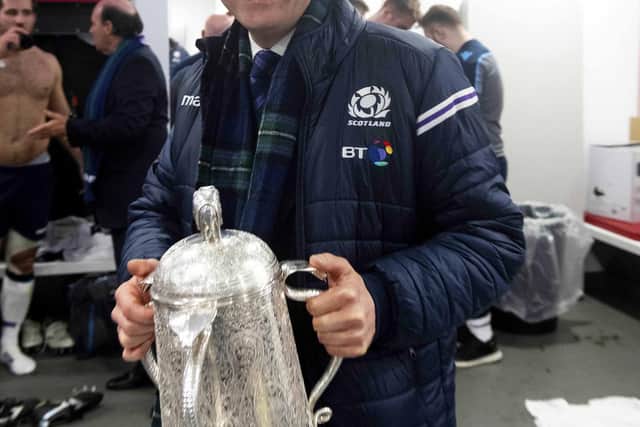 Dominic McKay with the Calcutta Cup after the draw between England and Scotland at Twickenham in 2019.