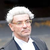 The leading QC was found dead at home in Glasgow