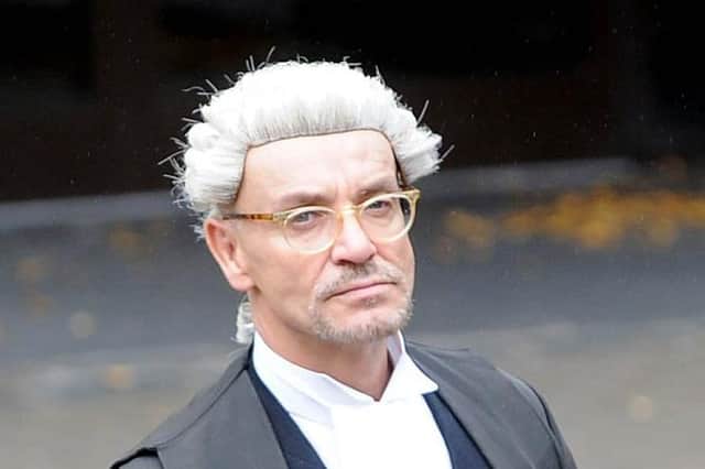 The leading QC was found dead at home in Glasgow