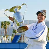 Patty Tavatanakit holds aloft the trophy after completing a wire-to-wire win in the 50th edition of the ANA Inspiration in California. Picture: Gabe Roux