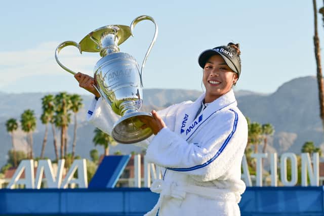 Patty Tavatanakit holds aloft the trophy after completing a wire-to-wire win in the 50th edition of the ANA Inspiration in California. Picture: Gabe Roux