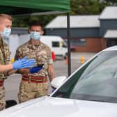 Nearly 100 soldiers, mainly from the Royal Scots Dragoon Guards, are being deployed by the British Army to help set up 80 new vaccination centres across Scotland