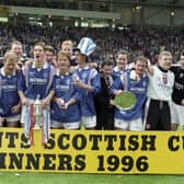 Rangers players celebrate winning the 1996 Scottish Cup.