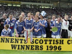 Rangers players celebrate winning the 1996 Scottish Cup.