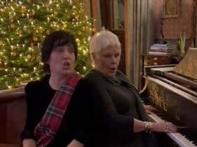 The pair burst into song just before midnight