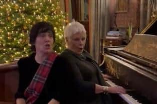 The pair burst into song just before midnight