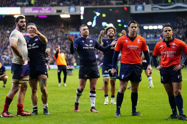 From left, France's Charles Ollivon and Scotland's Rory Darge, Finn Russell and Andy Christie wait for the TMO decision at Murrayfield alongside match referee Nic Berry. Picture: Jane Barlow/PA Wire