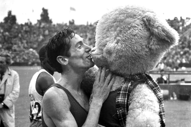 Lachie Stewart celebrates his stunning win in the 10,000 metres at the 1970 Commonwealth Games in Edinburgh. PIC: TSPL.