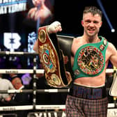 Josh Taylor celebrates victory in the junior welterweight bout against Jack Catterall.