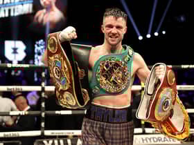 Josh Taylor celebrates victory in the junior welterweight bout against Jack Catterall.