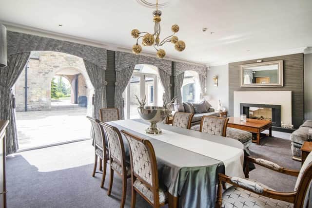 The house surrounds a stunning courtyard
