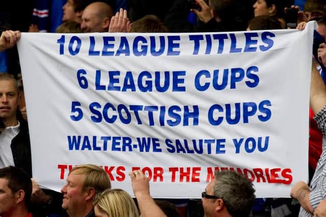 A banner held aloft by Rangers fans at Rugby Park in May 2011 detailing Walter Smith's trophy haul over two spells in charge of the Ibrox club. (Photo by Craig Williamson/SNS Group).