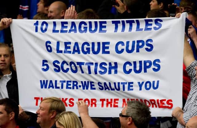 A banner held aloft by Rangers fans at Rugby Park in May 2011 detailing Walter Smith's trophy haul over two spells in charge of the Ibrox club. (Photo by Craig Williamson/SNS Group).