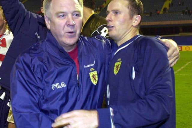 Gallacher, who won 53 caps for his country, with manager Craig Brown