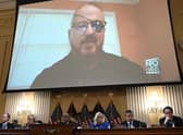 Stewart Rhodes, founder of the Oath Keepers, is seen on a screen during a House Select Committee hearing to Investigate the January 6 attack on the US Capitol. Picture: Brendan Smialowski/AFP via Getty Images