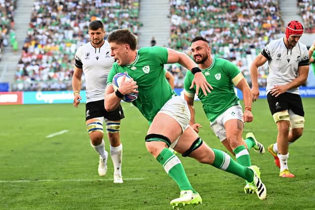 Ireland lock Joe McCarthy runs in for a try during the Rugby World Cup win over Romania. (Photo by CHRISTOPHE ARCHAMBAULT/AFP via Getty Images)