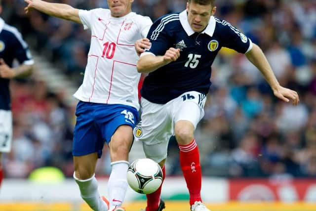 Dusan Tadic with Jamie Mackie during 2012 0-0 draw