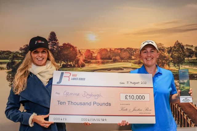 Gemma Dryburgh, right, after receiving the trophy and her £10,000 cheque from Kate Rose following the Scot's play-off victory at JCB Golf & Country Club in Uttoxeter. Picture: Rose Ladies Series