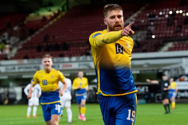 St Johnstone's Shaun Rooney celebrates making it 1-0 during his side's dramatic penalty shoot-out win over Dunfermline Athletic (Photo by Ross Parker / SNS Group)