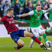 Hibs winger Martin Boyle is tackled by Kilmarnock's Lewis Mayo during the match at Easter Road. (Photo by Mark Scates / SNS Group)