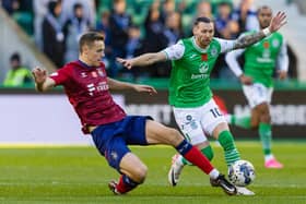 Hibs winger Martin Boyle is tackled by Kilmarnock's Lewis Mayo during the match at Easter Road. (Photo by Mark Scates / SNS Group)