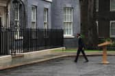 Prime Minister Rishi Sunak walks back into Number 10 after announcing the date for the UK General Election in Downing Street. Picture: Carl Court/Getty Images