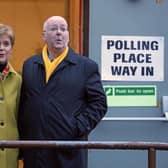 SNP leader Nicola Sturgeon with husband Peter Murrell as they cast their votes in the 2019 General Election at Broomhouse Park Community Hall in Glasgow. Picture: Andrew Milligan/PA Wire