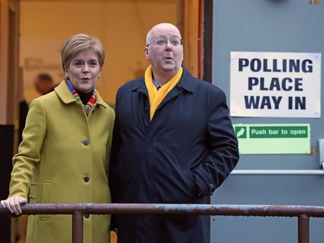 SNP leader Nicola Sturgeon with husband Peter Murrell as they cast their votes in the 2019 General Election at Broomhouse Park Community Hall in Glasgow. Picture: Andrew Milligan/PA Wire